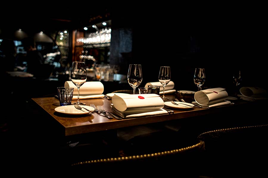 a desk with a laptop on a table
