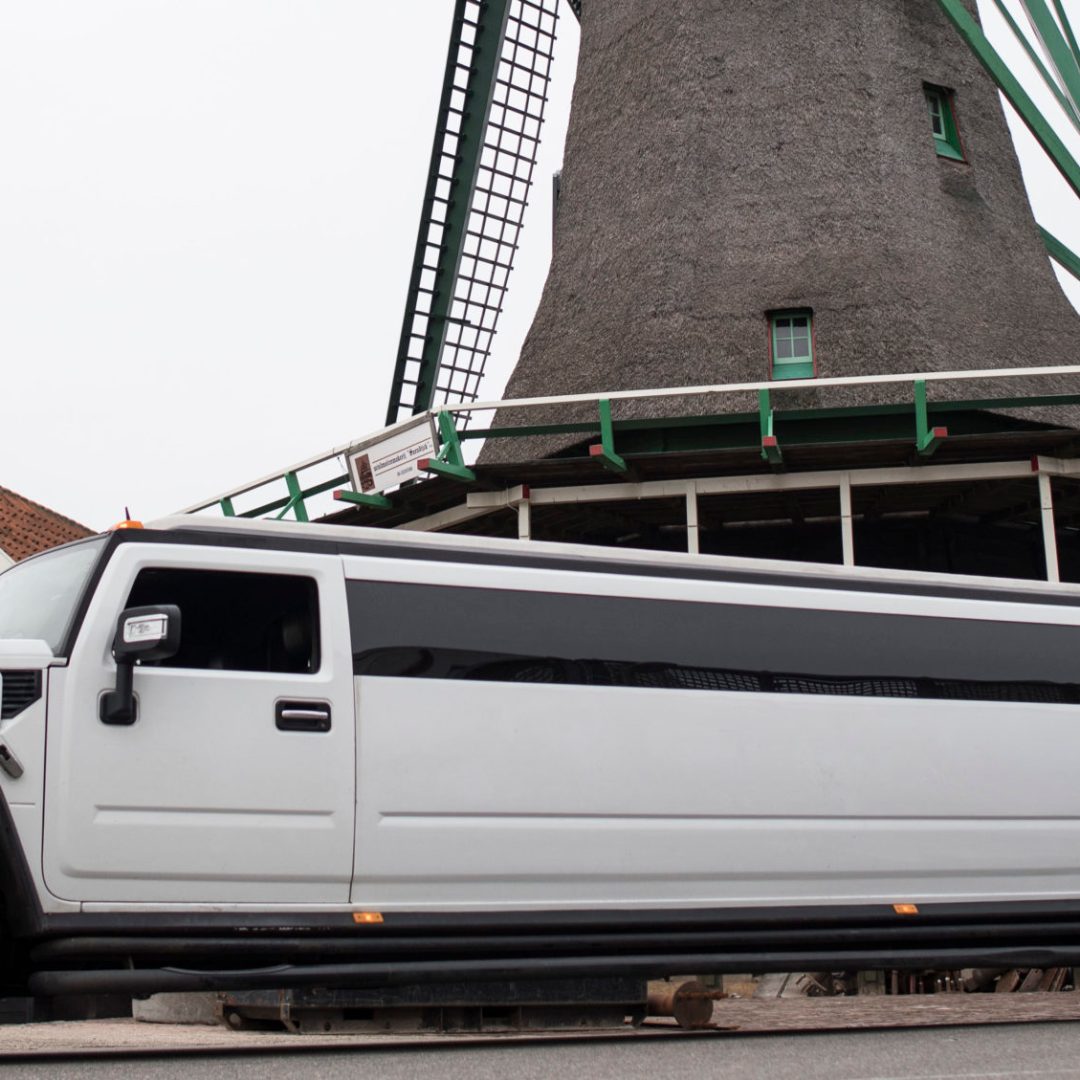 a van parked on the side of a building